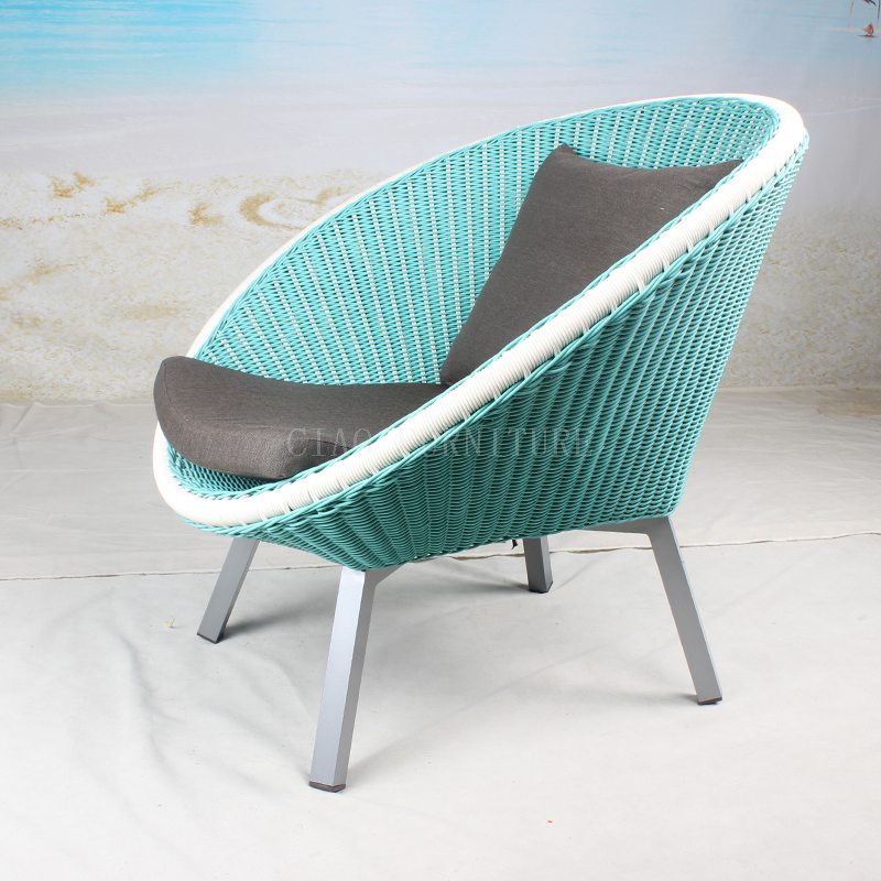 Outdoor wicker patio chair with cushion