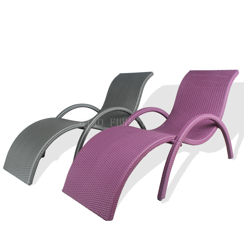 Rattan outdoor poolside sun lounger